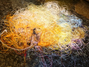 Waste Thread from Unraveled Spools